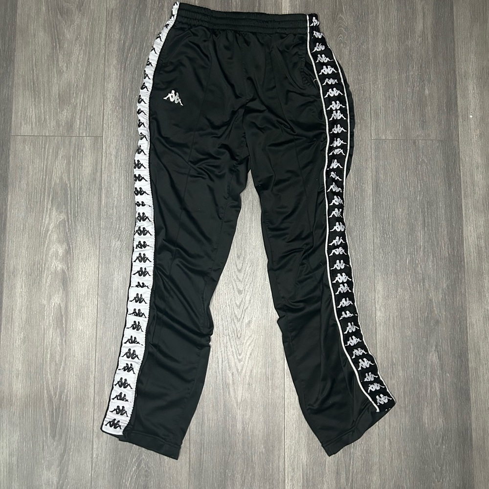 black kappa 222 logo straight leg track pants size small:
about 28"-30"waist
